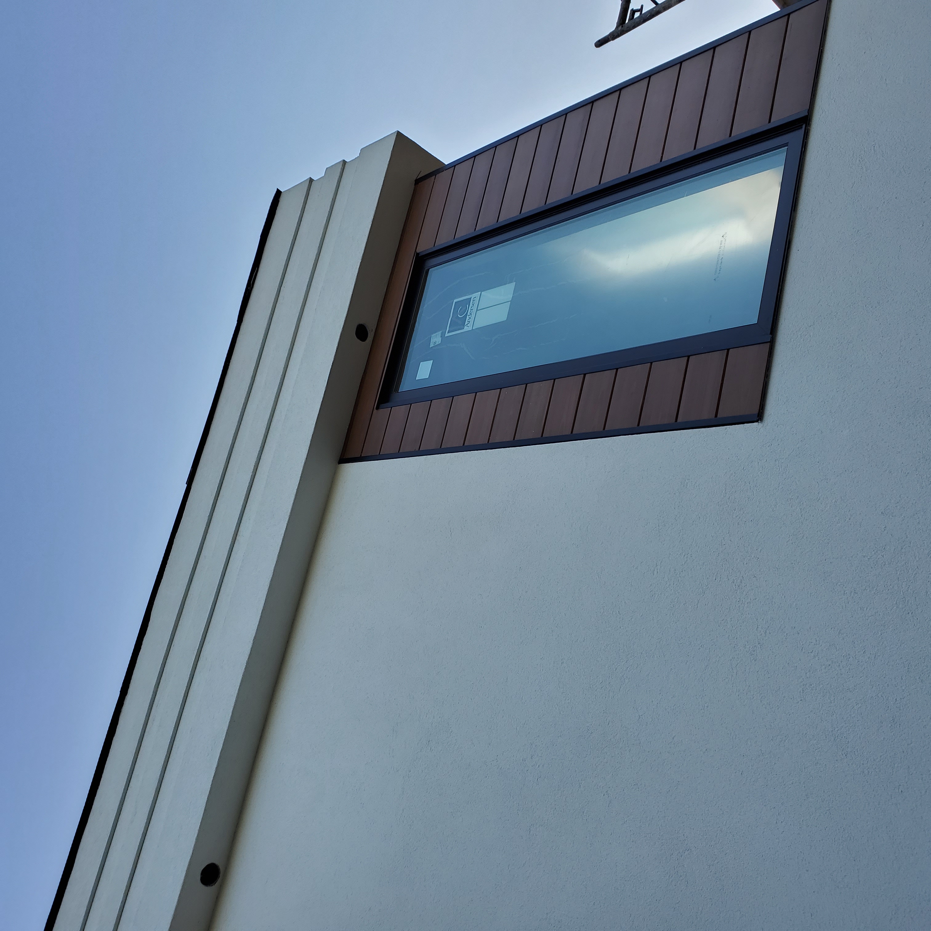 Faux wood finish detail on a Sarasota County exterior