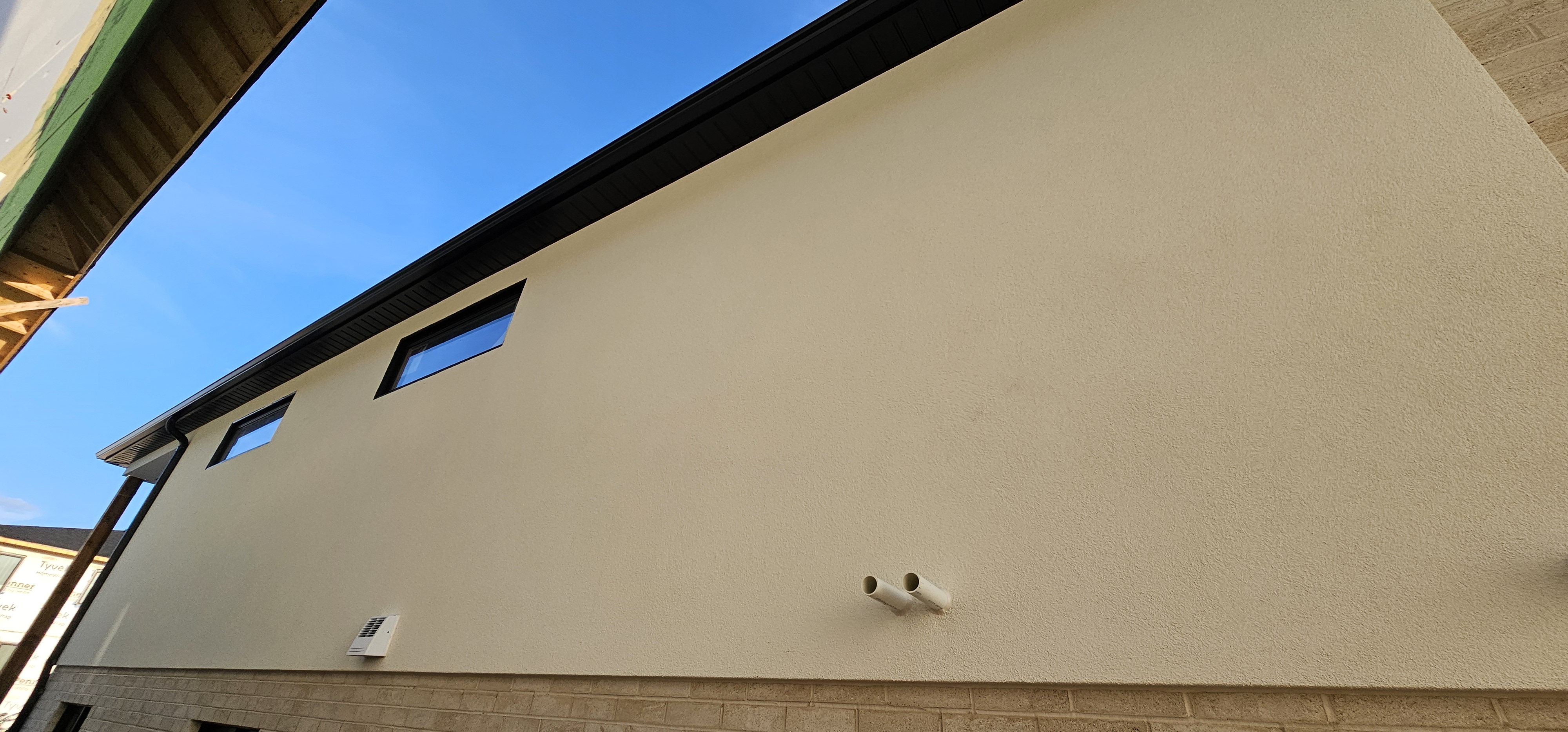 EIFS repair and layered exterior restoration detail